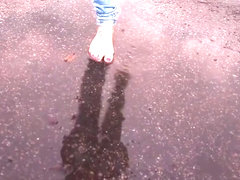 ella jolie barefoot in a carpark