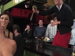 Busty brunette fucked in front of a bar full of people!!!!