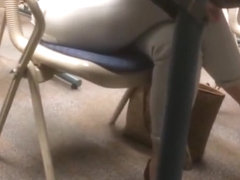 Candid dangling heels under the table coworker lunch