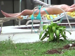 Hot neighbor babe, named Nikki, loves to tan topless in the backyard
