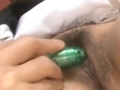 Ami Kurosawa maid with round cans gets vibrators in hairy pussy