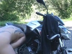 Cumshot on a bike from a big rubber dick. Squirt