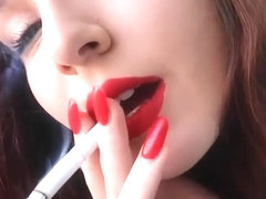 perfect red lipstick and nails seductive smoking close-up
