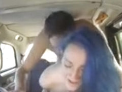 Big tits woman and her hubby fucking in the backseat
